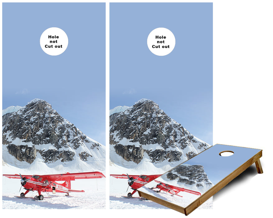 Airplane on the side of a mountain in the snow Cornhole wraps