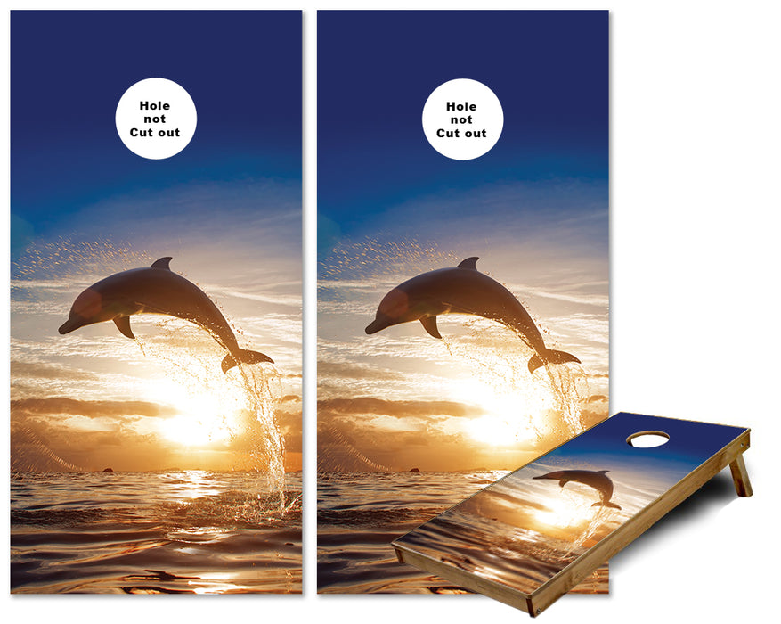 Dolphins Jumping during a sunset cornhole wraps