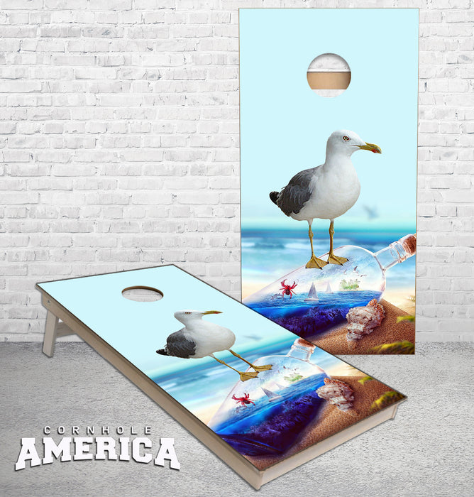 Sea Gull Standing on Glass bottle of Ocean View Sailboats cornhole boards