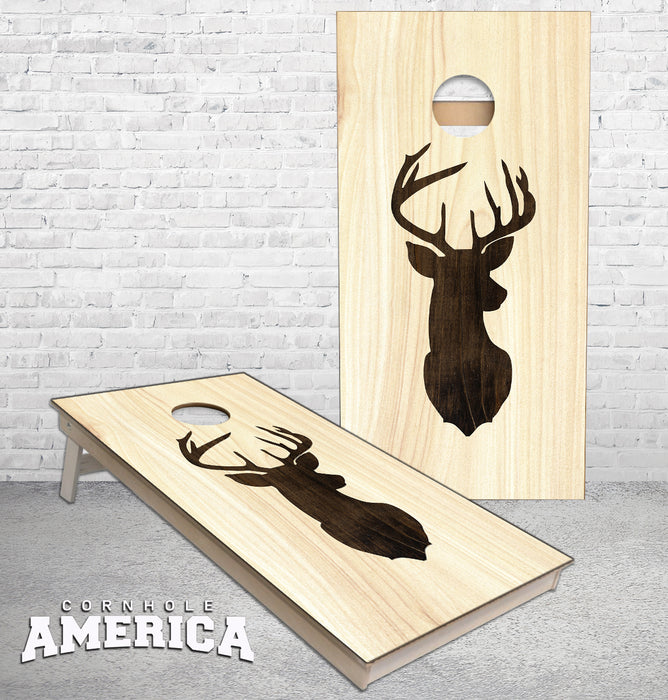 Whitetail Buck Deer Silhouette dark stained on light wood cornhole boards